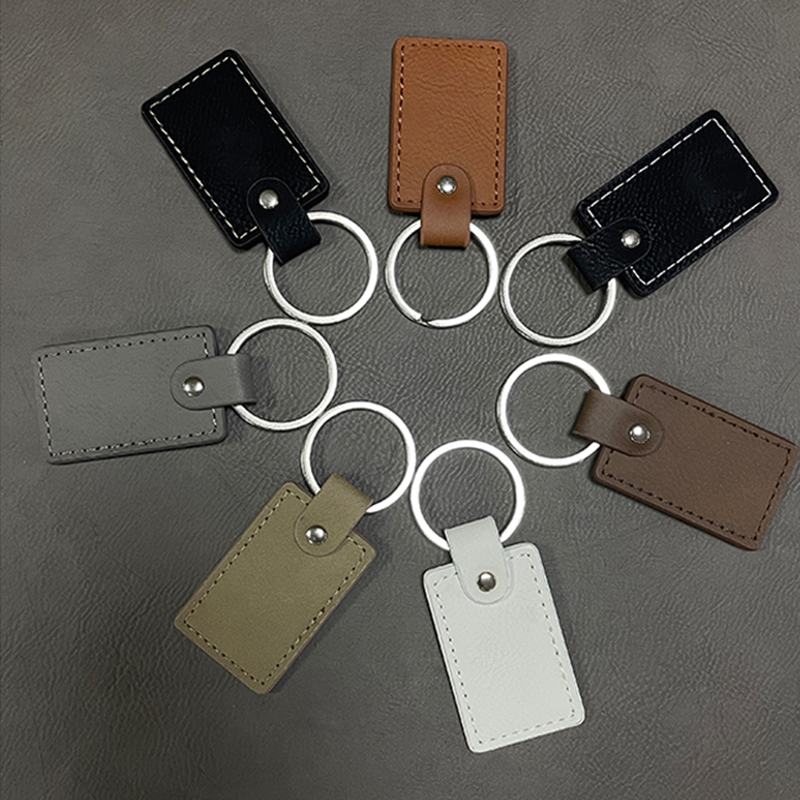 Laserable Leatherette Rectangle Keychain na may Oiled Edge Laserable Leatherette Rectangle Keychain na may Oiled Edge
