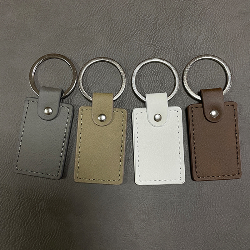 Laserable Leatherette Rectangle Keychain na may Oiled Edge Laserable Leatherette Rectangle Keychain na may Oiled Edge