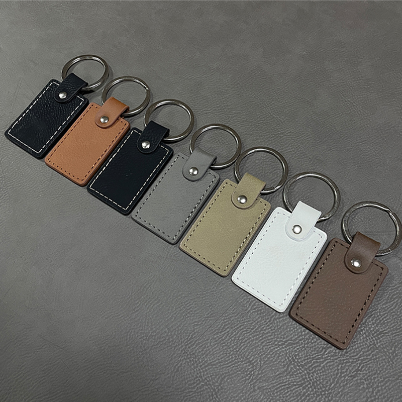 Laserable Leatherette Rectangle Keychain na may Oiled Edge Laserable Leatherette Rectangle Keychain na may Oiled Edge