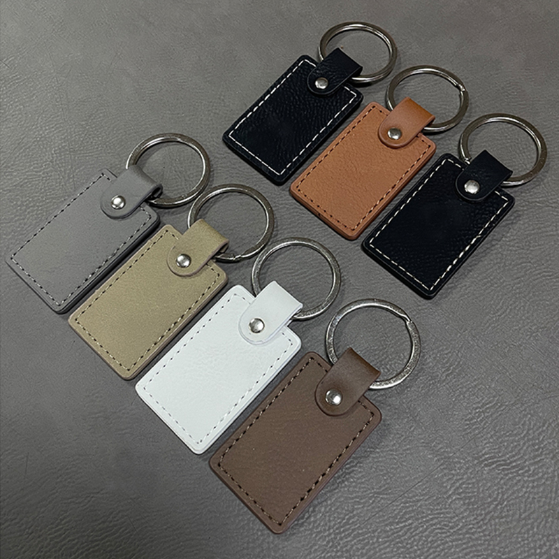 Laserable Leatherette Rectangle Keychain na may Oiled Edge Laserable Leatherette Rectangle Keychain na may Oiled Edge